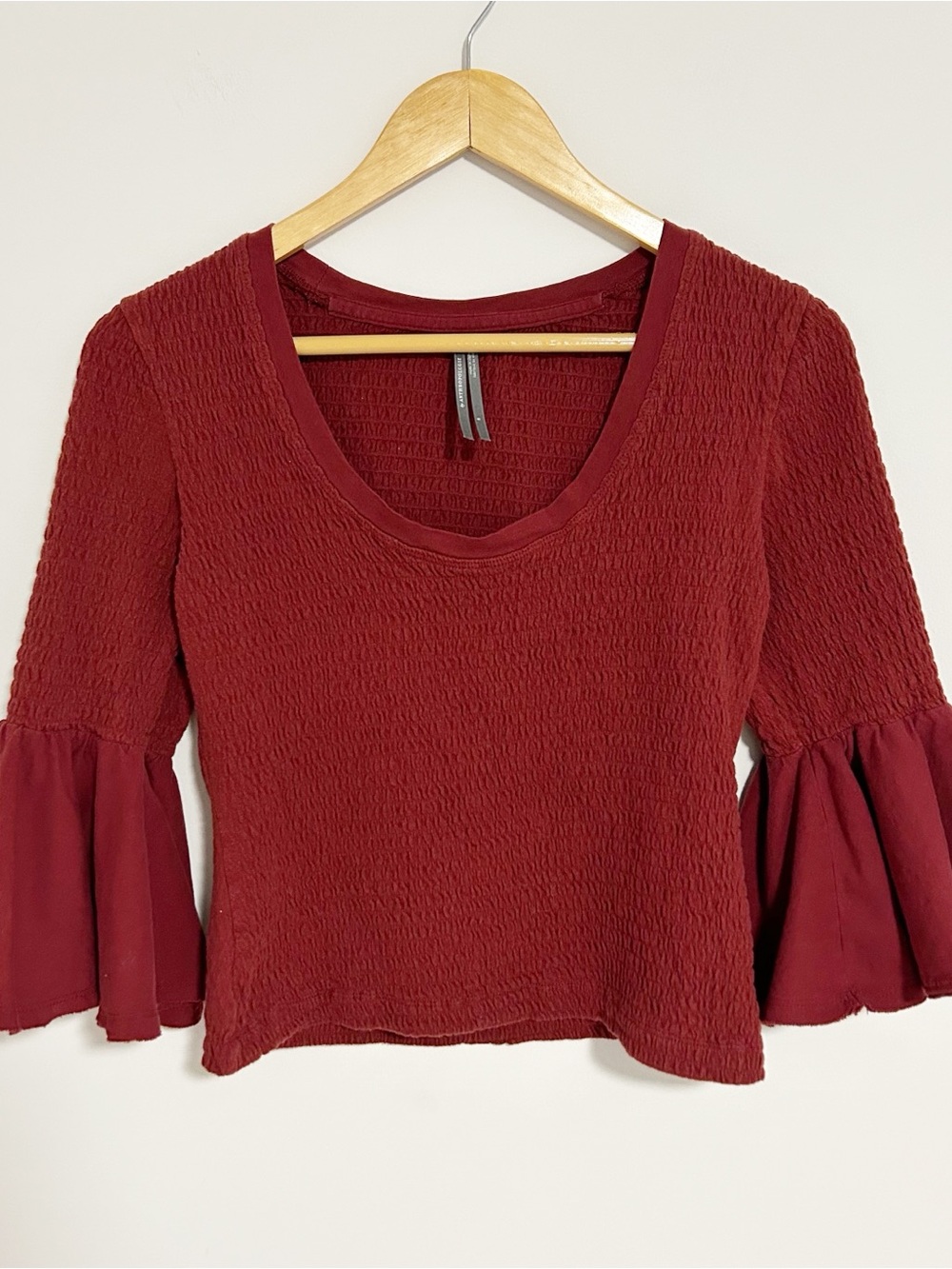 Anthropologie Smocked bell sleeve blouse burgundy